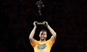 Stephen Curry hoists his second consecutive MVP trophy prior to Game 5 of the second round of the Western Conference Semifinals vs. the Portland Trail Blazers at Oracle Arena.  (Photo courtesy of Kyle Terada-USA TODAY Sports)