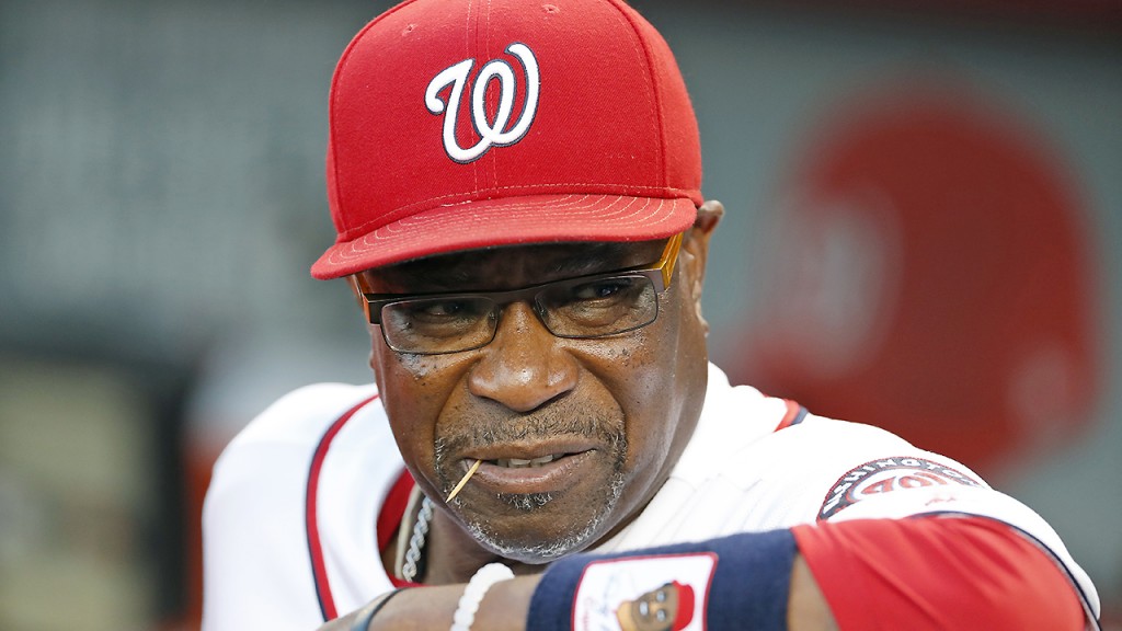 Washington Nationals manager Dusty Baker looks on from the dugout before a baseball game against the New York Mets at Nationals Park, Tuesday, Sept. 13, 2016, in Washington. (AP Photo/Alex Brandon)